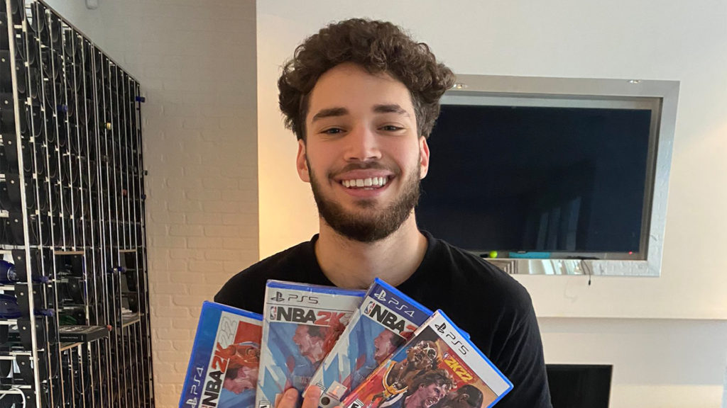 adin ross with his NBA cards